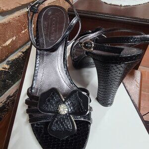 Coach Bryanna Kidskin Black & silver flower heels size 6 ankle strap
